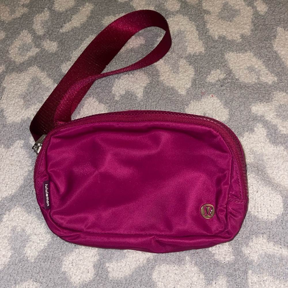 Rare berry colored Lululemon pouch excellent condition
